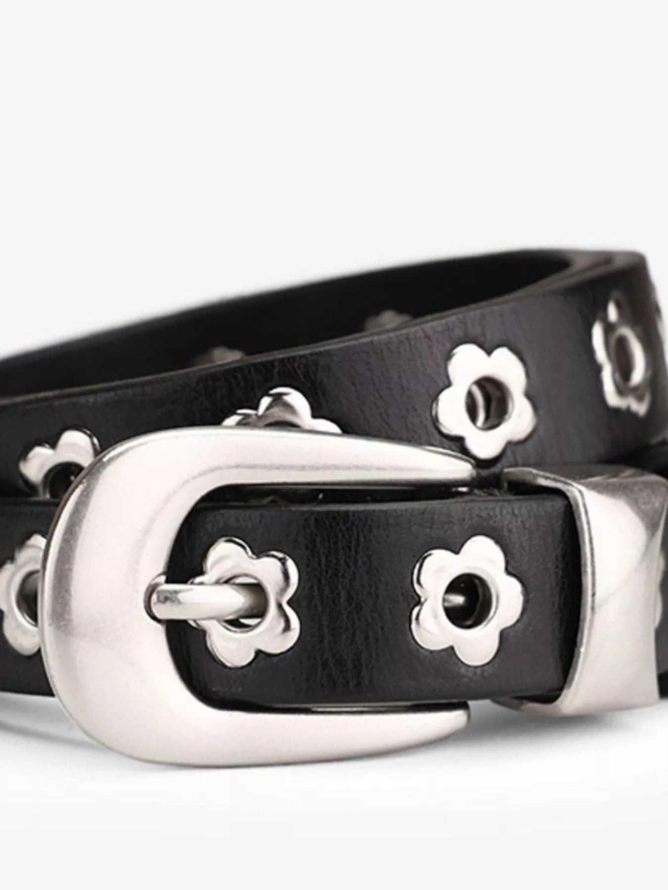 Black leather belt with silver floral buckles on a white background