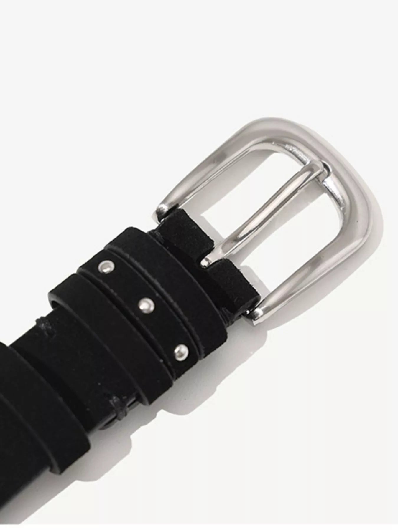 Black belt with a silver buckle on a white background