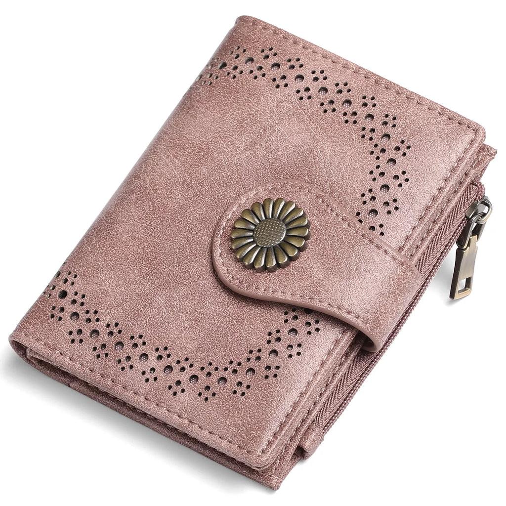 Pink wallet with decorative button on a white background