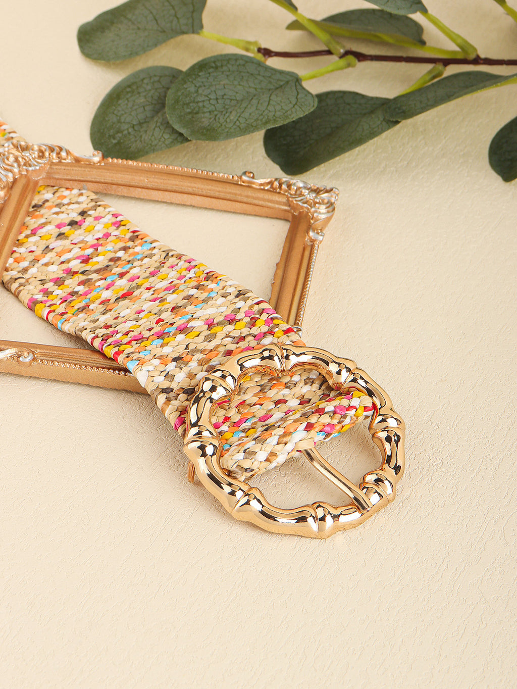 Colorful belt on a beige background