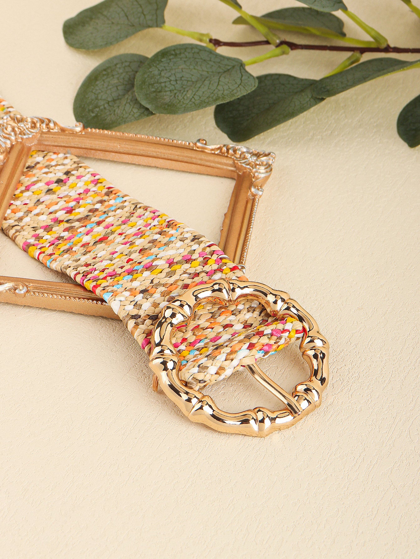 Colorful belt on a beige background