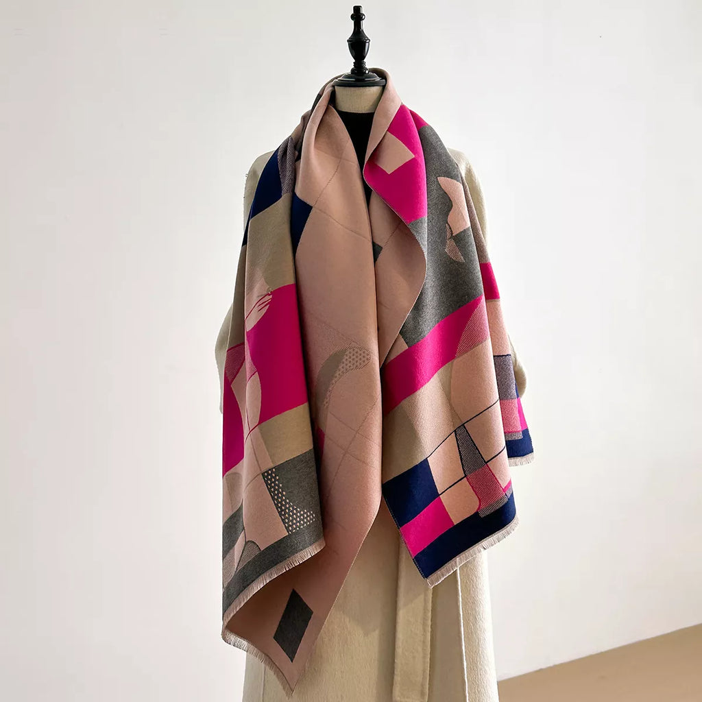 Colorful geometric-patterned scarf on a mannequin against a white background