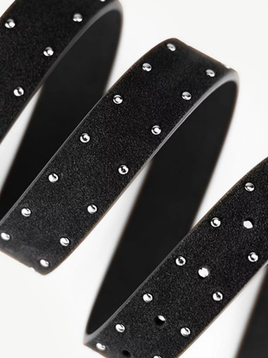 Black headbands with silver studs on a white background