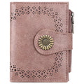 Pink wallet with floral design and button on a white background