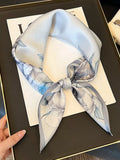 Floral Print Silk Square Scarf Goddess Copper floral print silk square scarf in vibrant colors on white background

