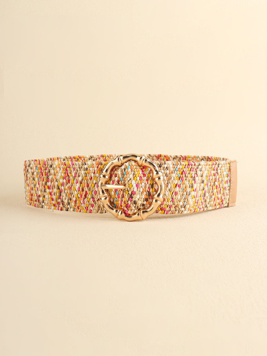 Multicolored beaded belt with a gold buckle on a beige background