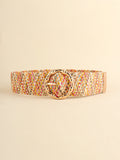 Multicolored beaded belt with a gold buckle on a beige background