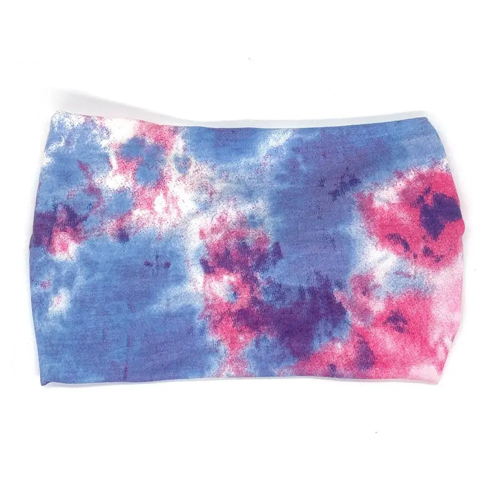 Tie-dye tube top with pink and blue patterns on a white background