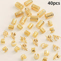 Collection of gold beads and small jewelry pieces on a light background with '40pcs' text.