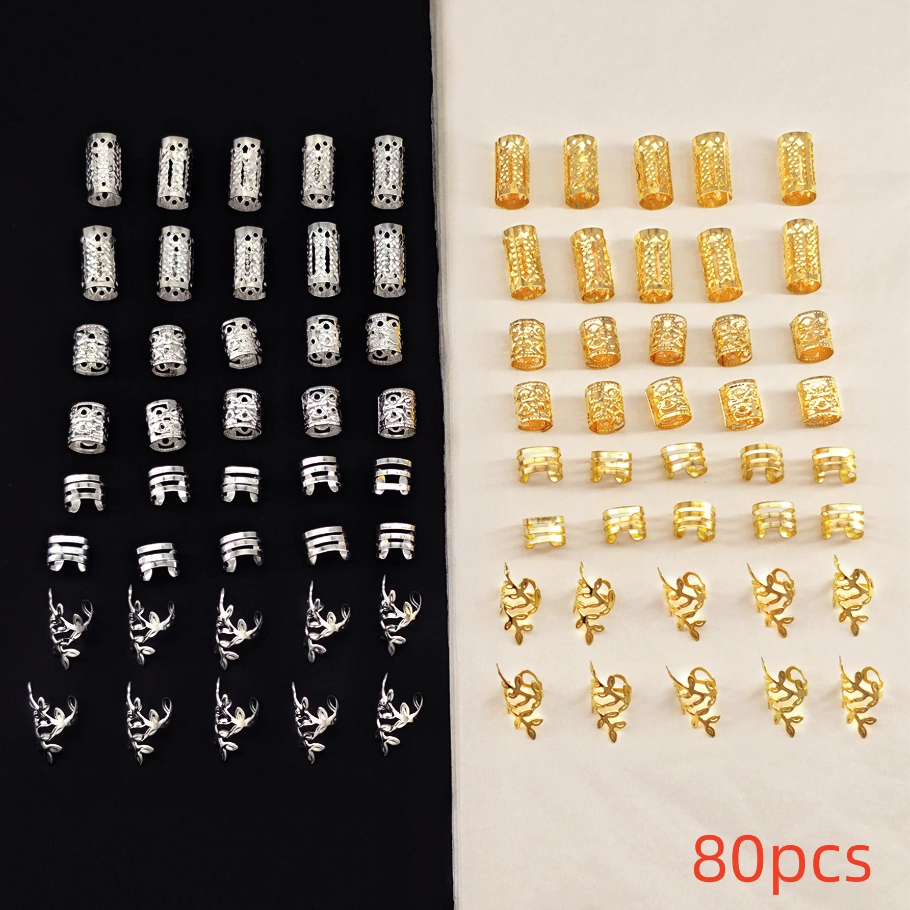 Collection of silver and gold beads on a black and white background