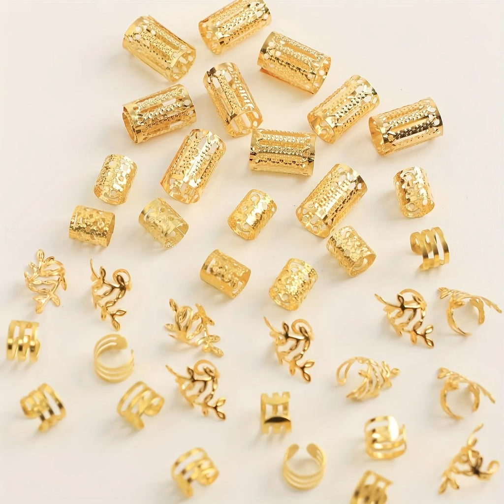 Collection of gold jewelry components on a light background