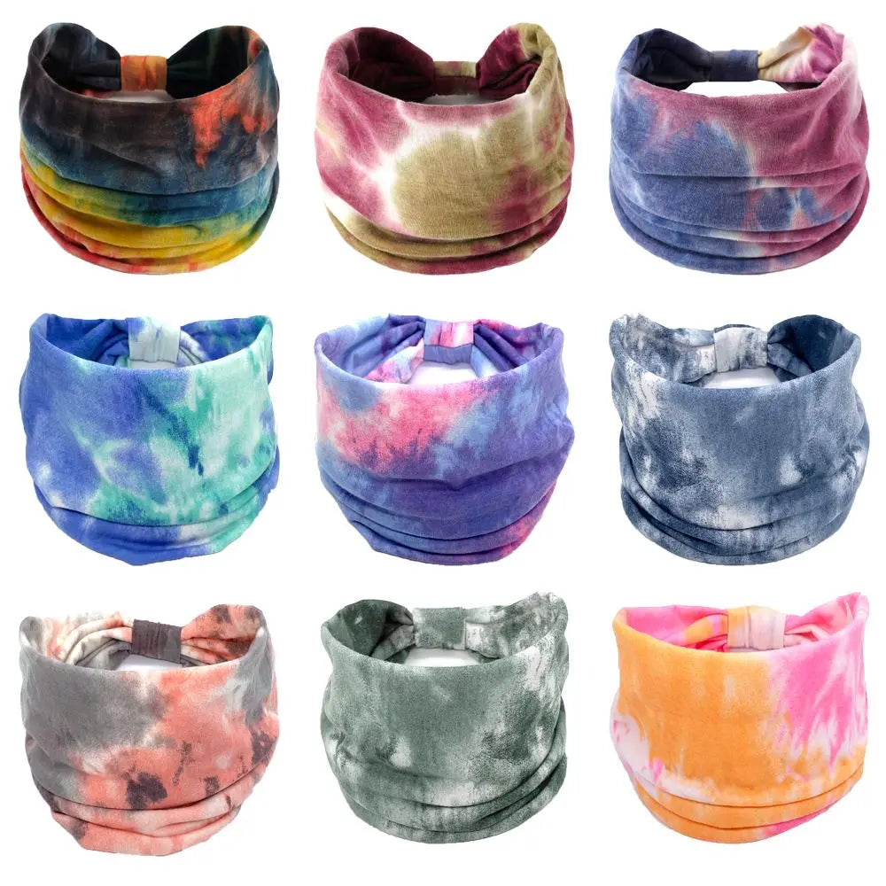 Nine tie-dye headbands in various colors on a white background