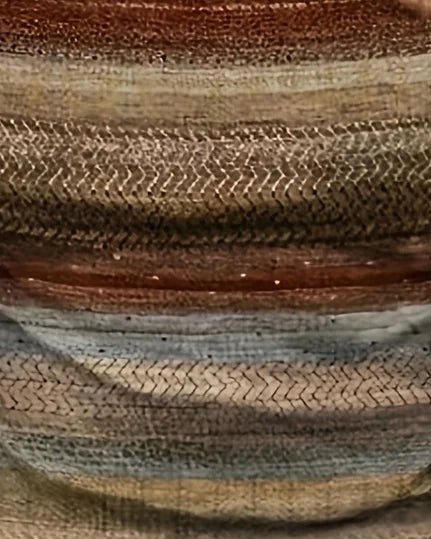 Close-up of a textured fabric with brown and beige colors