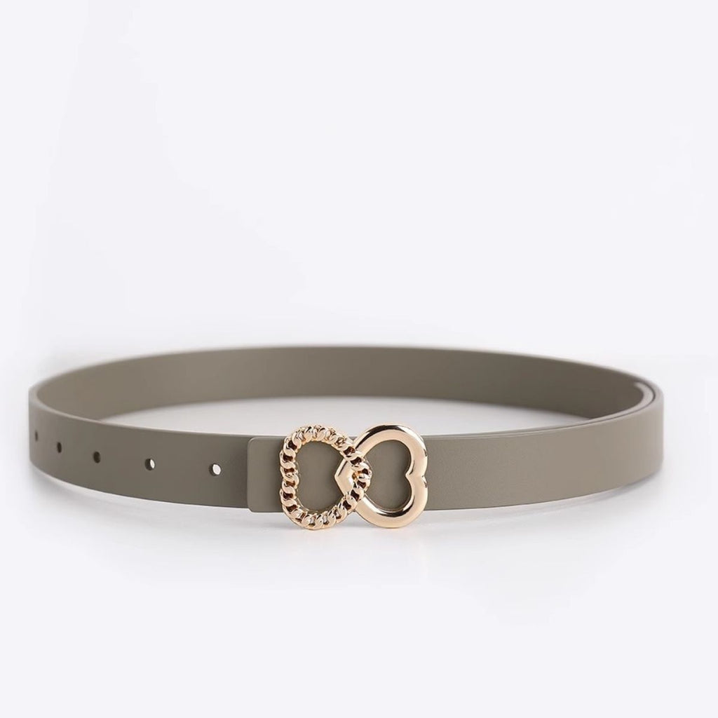 Gray belt with a gold heart-shaped buckle on a white background