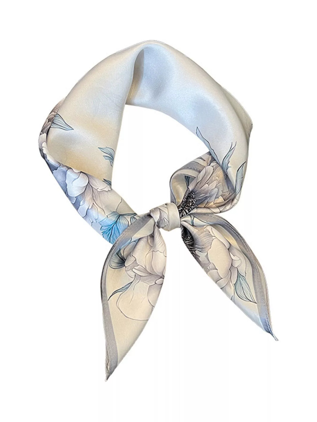 Floral patterned scarf tied in a knot on a white background