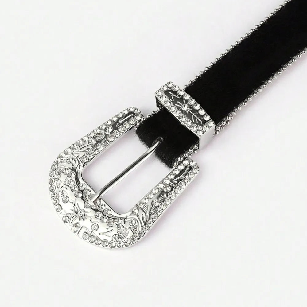 Black belt with a silver buckle on a white background