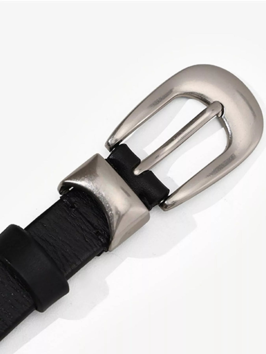 Black leather belt with a silver buckle on a white background
