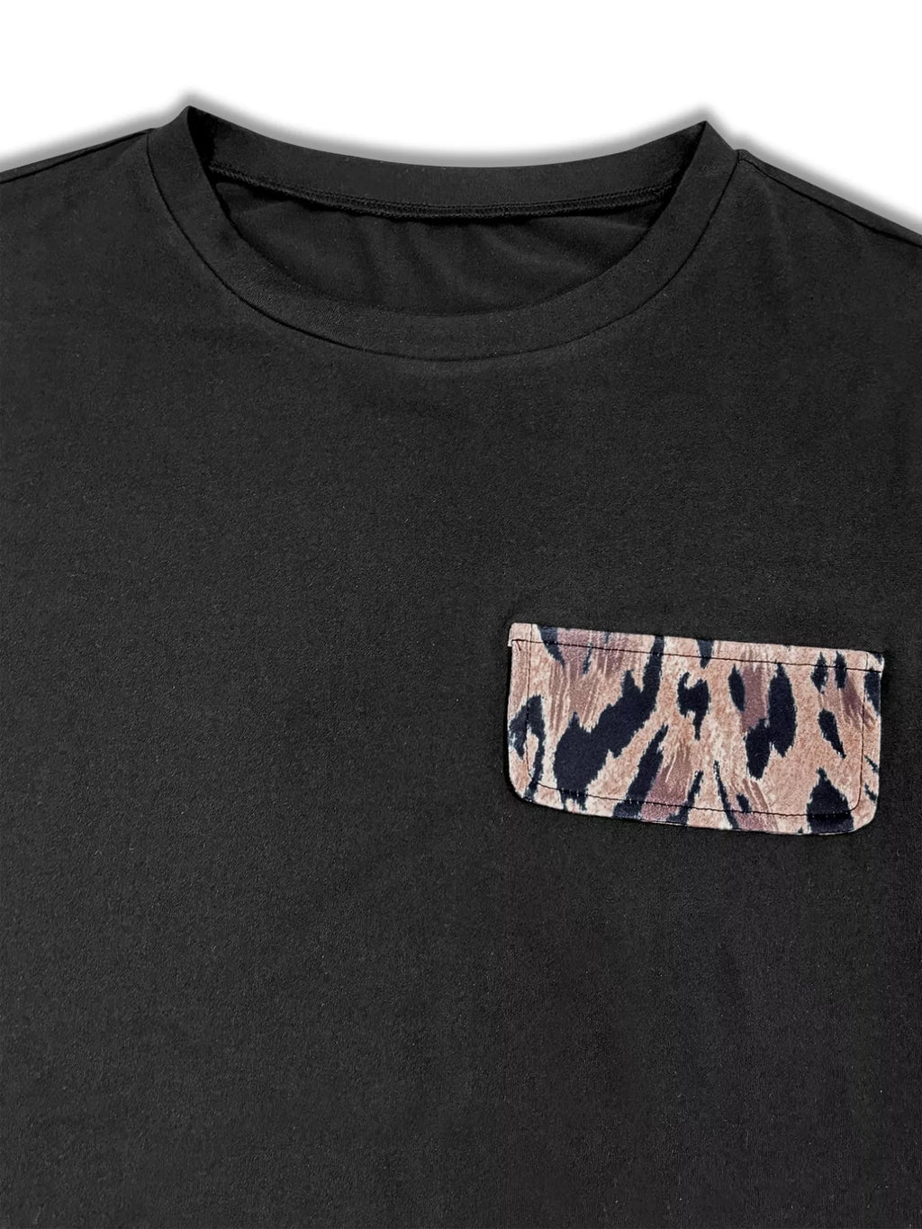 Black t-shirt with a camouflage pocket on a white background