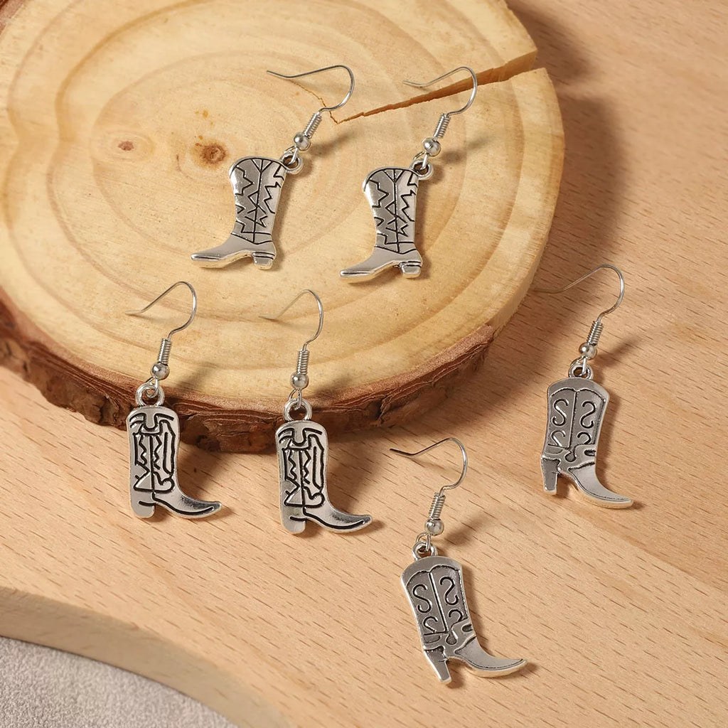 Goddess Copper Western Cowboy Boot Dangle Earrings – lifestyle flat lay
