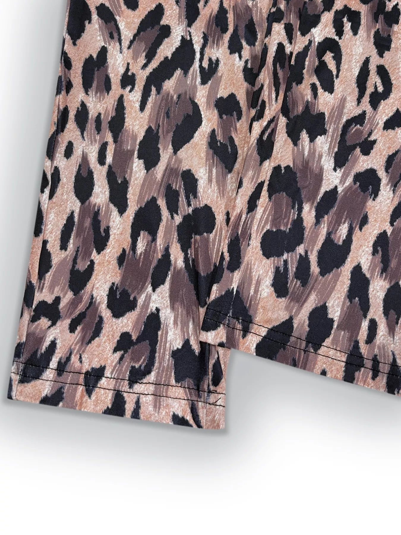 Leopard print fabric on a white background