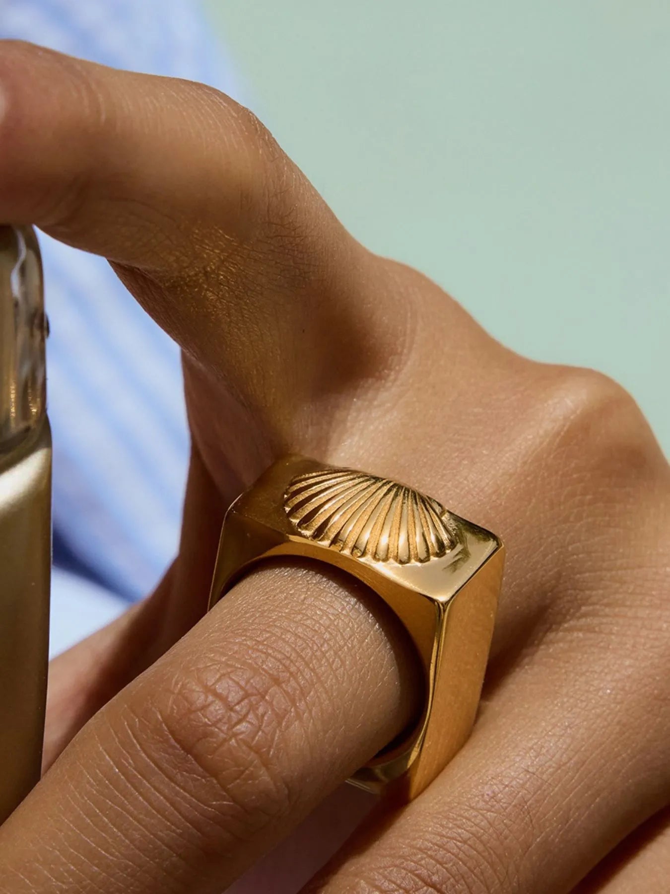 on-hand lifestyle / shell inlay close-up
